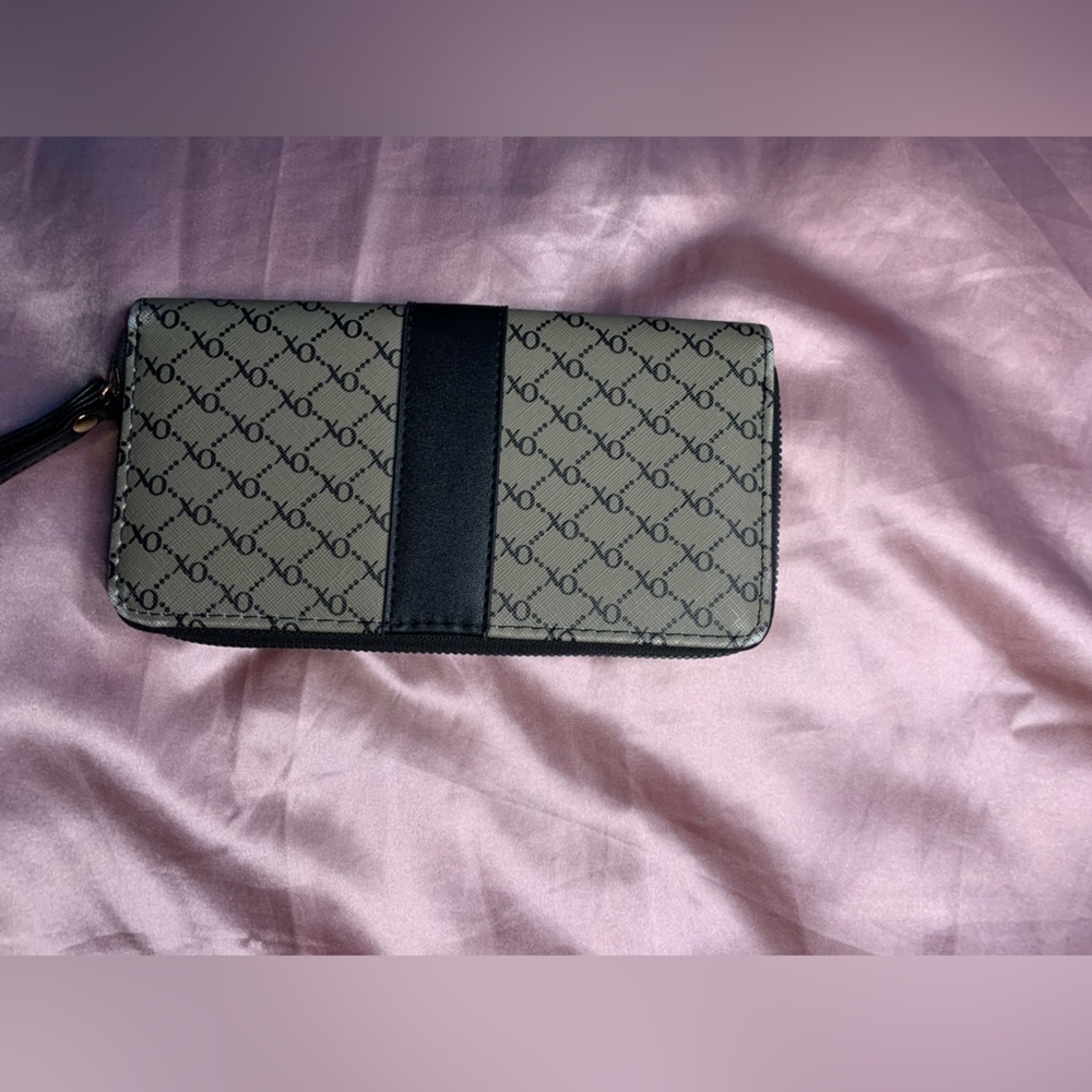 XOXO wallet I don’t use it but it’s nice still in like new condition